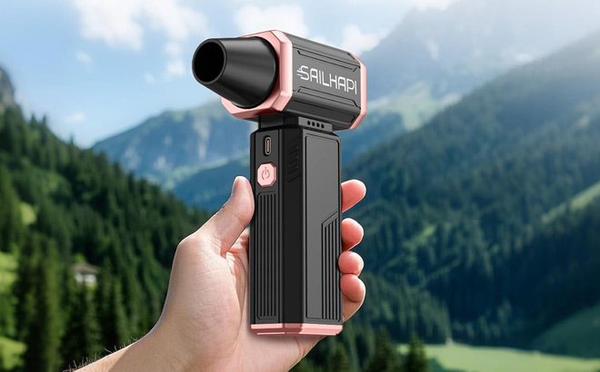 A Person Holding Compressed Air Duster