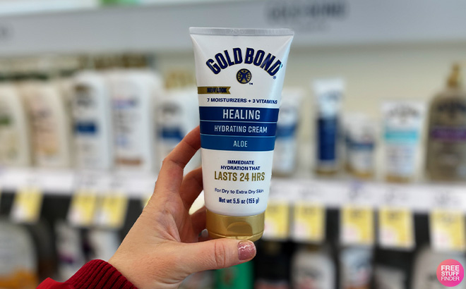 A Person Holding Gold Bond Healing Skin Therapy Lotion