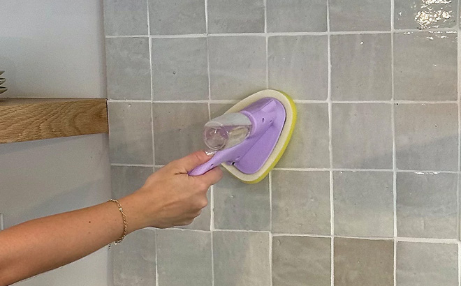 A Person Using a ThreeSixFive Handheld Cleaning Sprayer