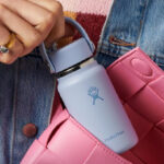 A Person holding a Hydro Flask Micro Water Bottle in Surf Color