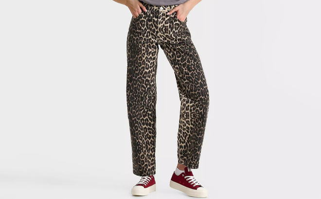 A Person wearing Unlike Humans Womens Leopard Denim Jeans