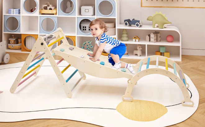 A Toddler Playing with a 7 in 1 Climbing Toy