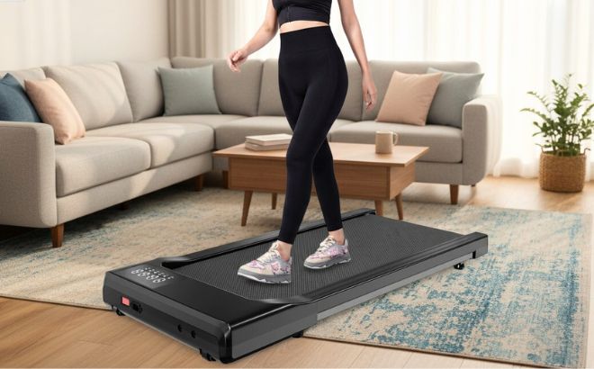 A Woman Using a Walking Pad at Home