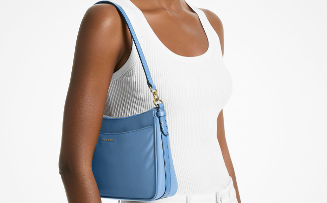 A Woman Wearing Michael Kors Jet Set Medium Nylon Convertible Pochette A Woman Wearing Michael Kors Jet Set Medium Nylon Convertible Pochette
