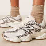 A Woman Wearing New Balance 9060 Sneakers in Leopard Print