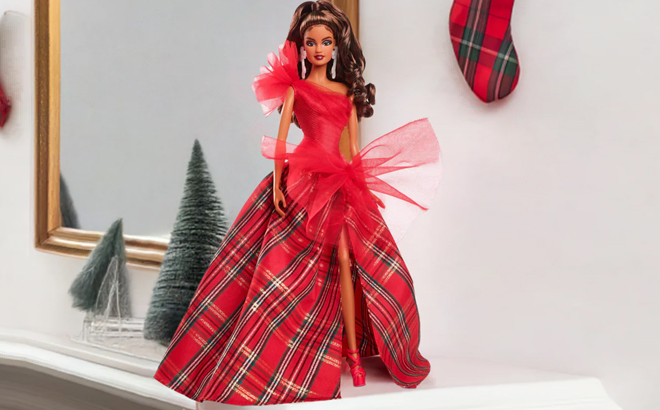 Barbie Signature 2024 Holiday Doll on a Tabletop