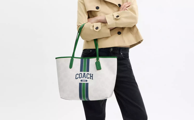 Coach Outlet City Tote Bag In Signature Canvas With Coach Graphic Coach Outlet City Tote Bag In Signature Canvas With Coach Graphic