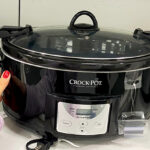 Crock Pot 7 Quart Countdown Cook Carry Slow Cooker on a Store Shelf