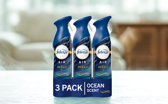 Febreze Air Freshener 3 Pack on a Table Febreze Air Freshener 3 Pack on a Table