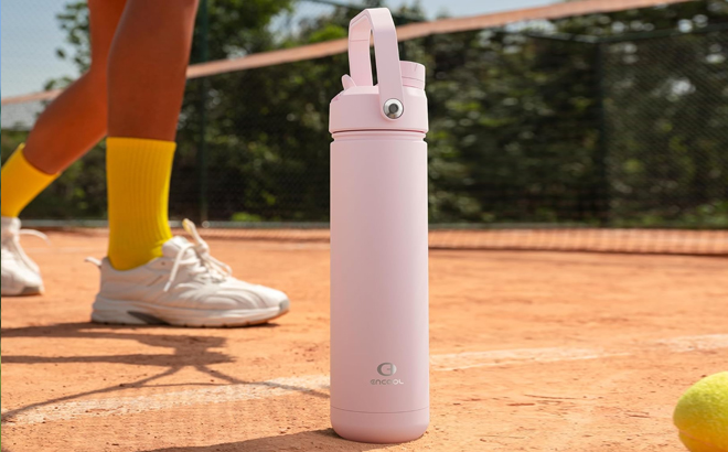 Insulated Water Bottle on Tennis Playground Insulated Water Bottle on Tennis Playground