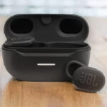 JBL Endurance Race TWS Earbuds on a Table