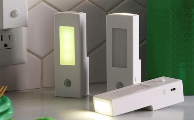 Living Glow 6 in 1 Color Changing Light with USB Charger on the Table