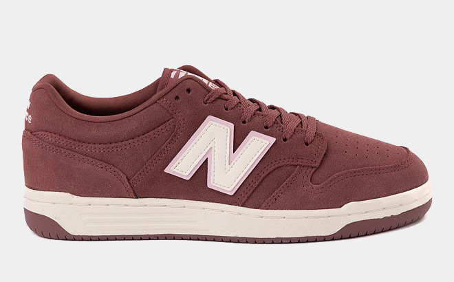 New Balance 480 Athletic Shoes on a Gray Background