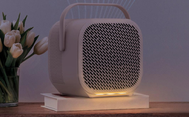 Pure Enrichment PureZone HEPA Air Purifier Night Light on a Table