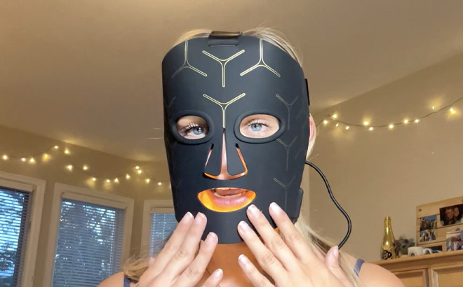 Women Wearing Infrared Red Light Therapy Mask