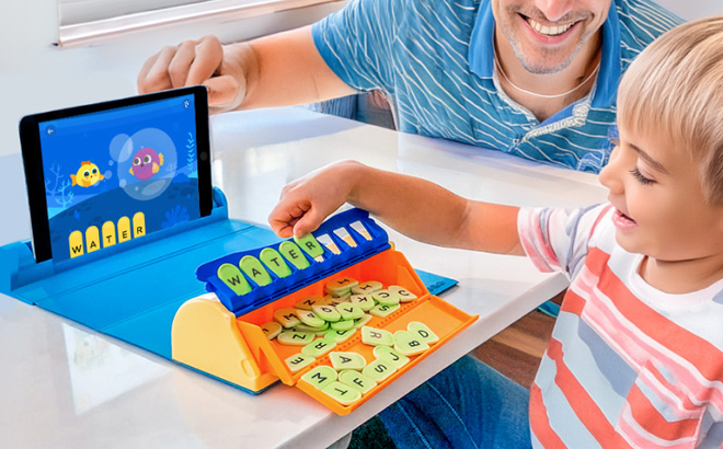 A Child Playing with PlayShifu Word Wiz Plugo Letters Learning Kit