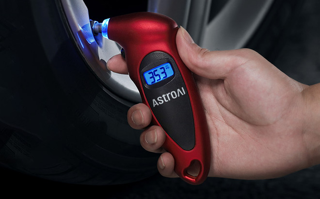 A Person Holding AstroAI Digital Tire Pressure