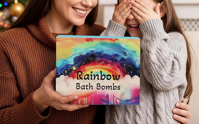 A Person Holding Rainbow Bath Bombs for Kids