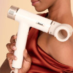 A Person Holding Shark SpeedStyle Hair Dryer