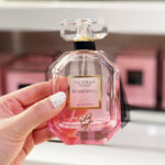 A Person Holding a Bottle of Victorias Secret Bombshell Perfume