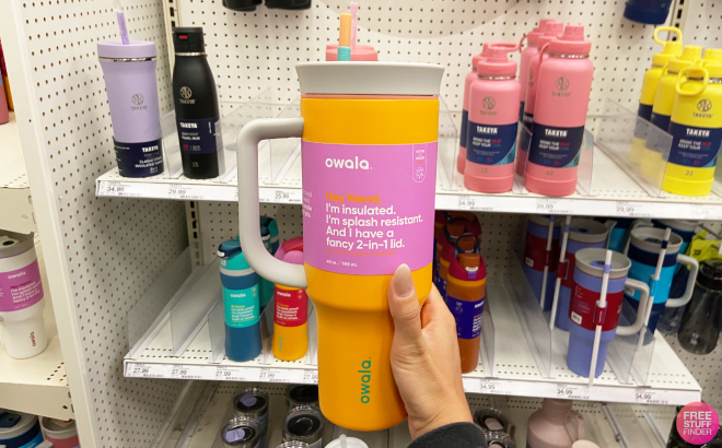 A Person Holding a Owala Stainless Steel Triple Layer Insulated Travel Tumbler