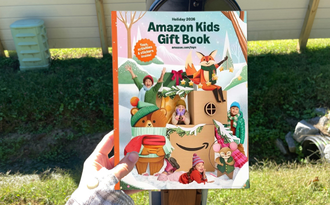 A Person Holding the Amazons Holiday Kids Gift Book 2026