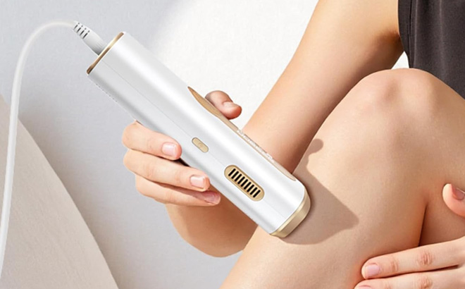A Person Using Amotaos IPL Laser Hair Removal