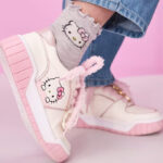 A Person Wearing The Childrens Place Hello Kitty Colorblock Low Top Sneakers