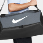A Person holding a Nike Brasilia 9 5 Training Duffel Bag