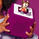 A Person holding a Toniebox Audio Player Starter Set with Playtime Puppy