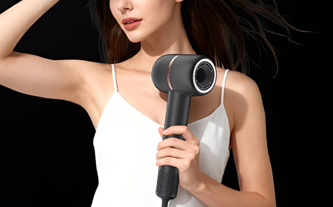 A Woman Holding a Negative Ionic Hair Blow Dryer