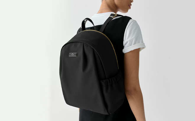 A Woman Wearing Kate Spade Carter Nylon Large Backpack