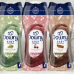 Downy Cozy Collection In Wash Laundry Scent Booster Beads on the Table