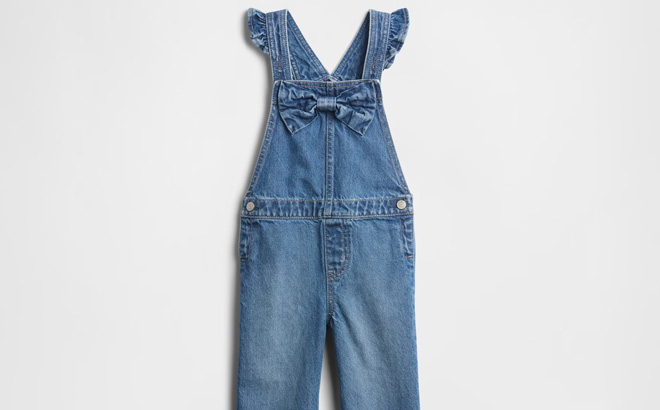 GAP Factory Toddler Denim Bow Overalls on the Gray Background GAP Factory Toddler Denim Bow Overalls on the Gray Background