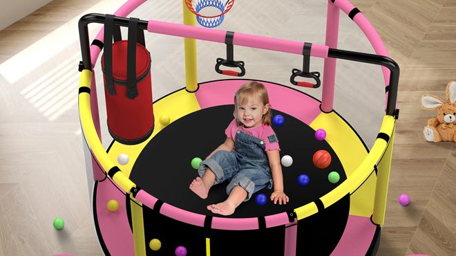 Girl Playing in a Mini Trampoline