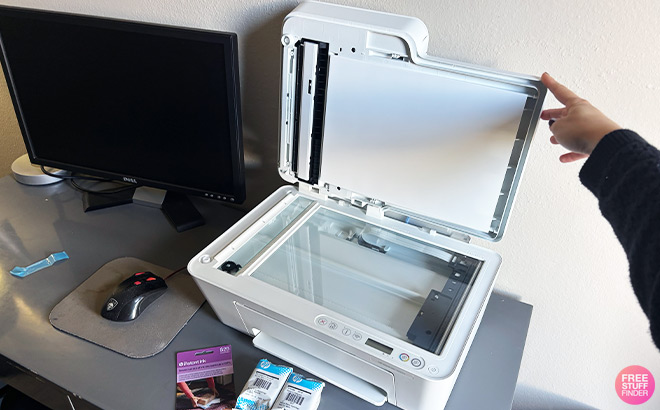 HP DeskJet Color Printer next to Screen