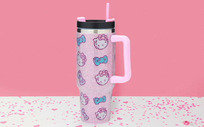 Hello Kitty Bow Bubble Rhinestone Stainless Steel Travel Cup on the Table