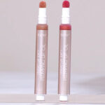 Tarte Maracuja Juicy Lip Plumping Oil 2 Pack on a Table