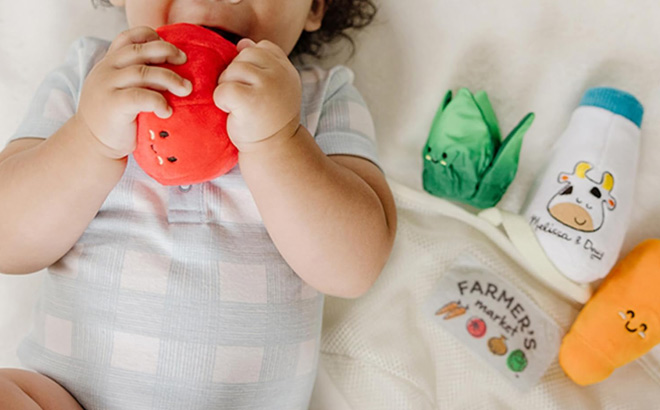 A Child Playing with Melissa Doug 5 Piece Multi Sensory Basket