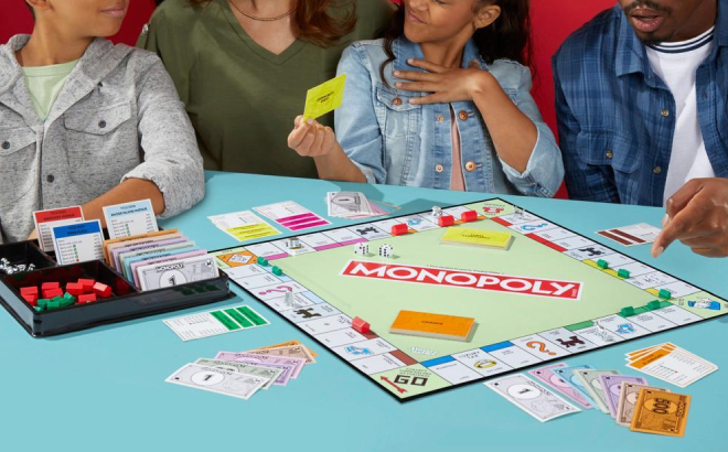A Family Playing Monopoly A Family Playing Monopoly