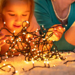 A Kid Holding Super Long 500 LED 178FT Christmas Lights