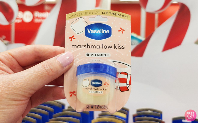 A Person Holding Vaseline Holiday Limited Edition Marshmallow Kiss Lip Balm