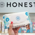 A Person Holding a Pack of Honest Company Wipes