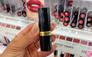 A Person Holding a Revlon Super Lustrous Lipstick