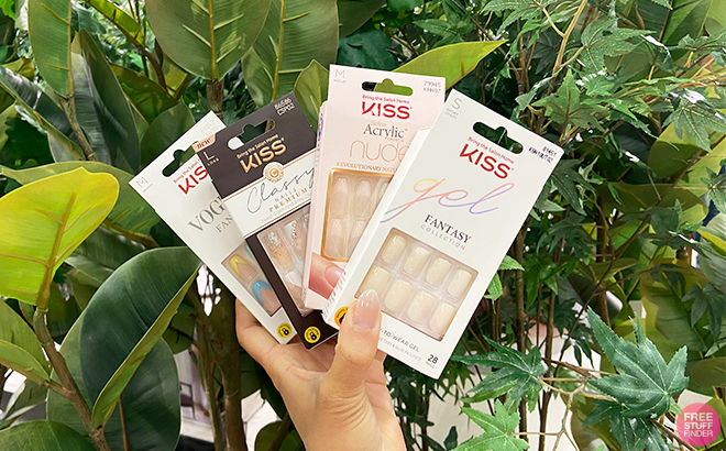 A Person Holding the KISS Fake Nails