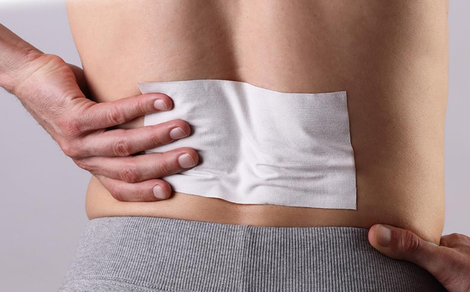 A Person Using Aspercreme Pain Relief Patch