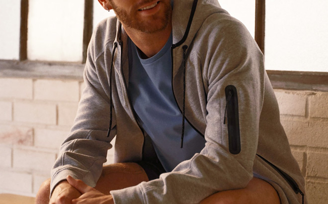 A Person Wearing CSG Active Commuter Hoodie A Person Wearing CSG Active Commuter Hoodie