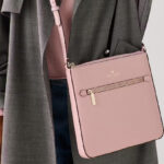 A Person Wearing Kate Spade Outlet Sadie Large Crossbody