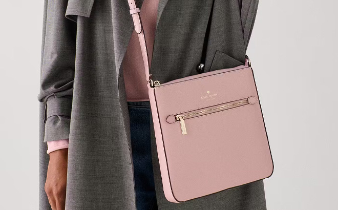 A Person Wearing Kate Spade Outlet Sadie Large Crossbody