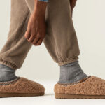 A Person Wearing UGG Tasman Maxi Curly Genuine Shearling Slippers